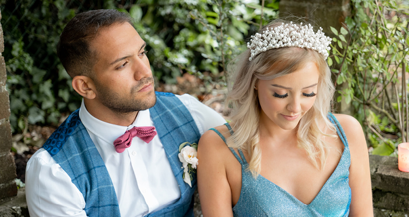 A male and female model in the grounds of Healing Manor