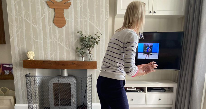 Older lady working out at home