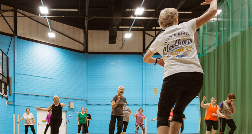 A group of older ladies exercising