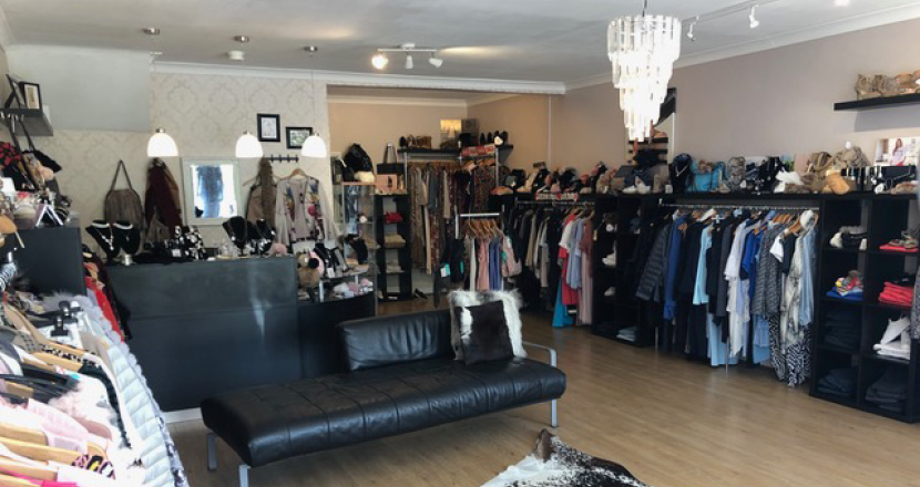 A shot inside The Boutique showing clothing products