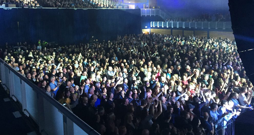 A photograph of a large crowd at Grimsby Auditorium