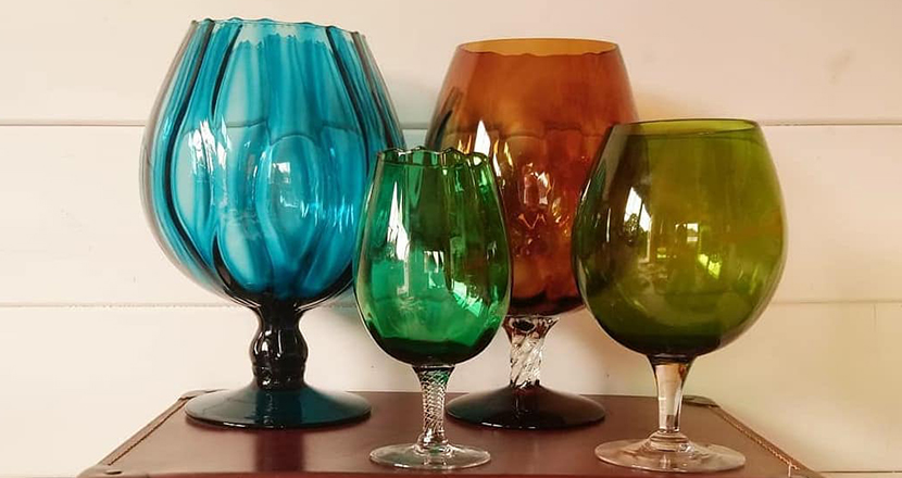 A photograph of colourful glassware