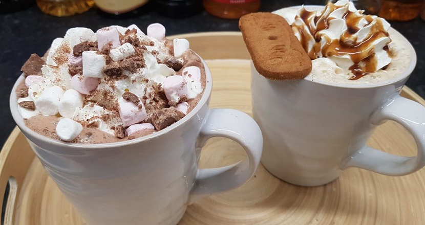 Image of two mugs of hot chocolate