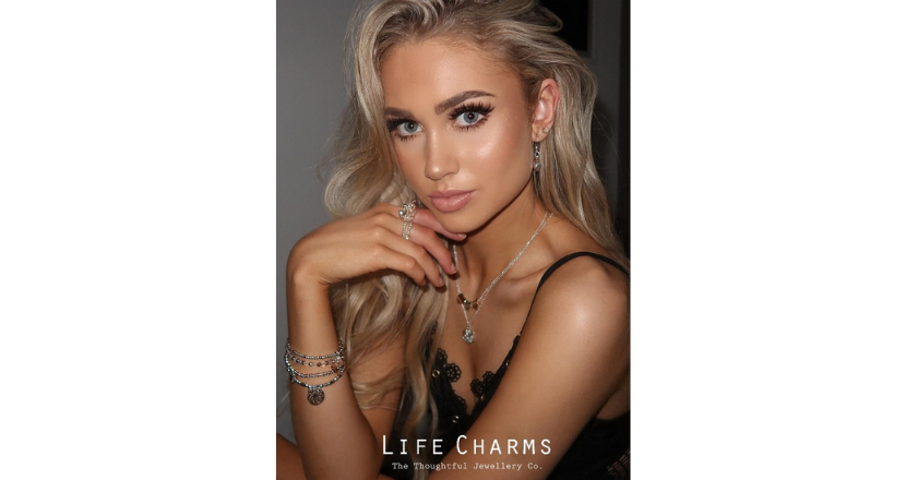 female model wearing charm bracelet